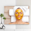 Mẫu tranh spa đẹp hình ảnh cô gái đắp mặt nạ vàng dưỡng da mặt