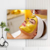 Mẫu tranh spa đẹp hình ảnh cô gái đắp mặt nạ dưỡng da màu vàng