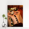 Mẫu tranh spa đẹp khổ đứng hình ảnh cô gái nằm thư giãn trong phòng spa với hàng đá cuội nóng chườm trên lưng, xung quanh trang trí hoa sứ trắng và nến thơm