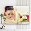 Mẫu tranh spa đẹp hình ảnh cô gái đẹp nằm thư giãn với khay nến thơm, tinh dầu, hoa lan bên cạnh