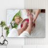 Mẫu tranh spa đẹp hình ảnh nhân viên đang massage chân cho khách hàng