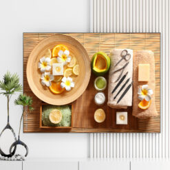 Mẫu tranh spa thiên nhiên đẹp hình ảnh chậu nước với hoa sứ, nến thơm, những lát cam và chanh, muối khoáng, khăn tắm, dụng cụ làm nail